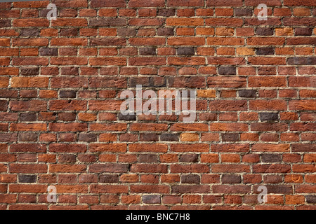 Red Brick Wall. A section of a red or orange brick wall. Good for backgrounds. Stock Photo