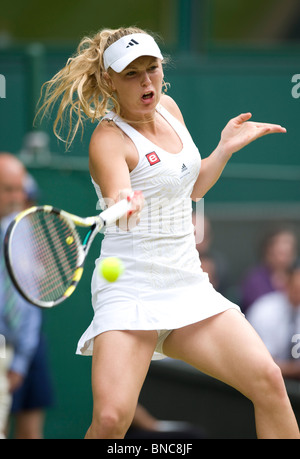 Caroline Wozniacki (DEN) in action during the Wimbledon Tennis Championships 2010 Stock Photo