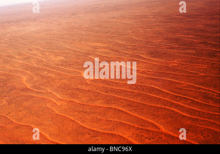 Aerial view over the parallel sand dunes of the Simpson Desert, Central Australia Stock Photo