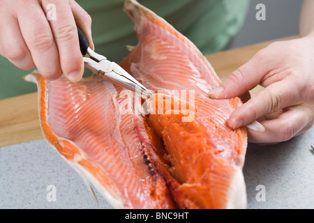 Contemporary White Kitchen with Concrete Countertop, Pull-Out Cutting Board  Stock Photo - Alamy