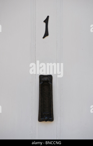 No. 1 white front door of house in Hay-on-Wye Powys Wales UK Stock Photo