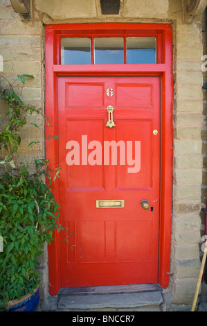 No 6 red front door of house in Hay-on-Wye Powys Wales UK