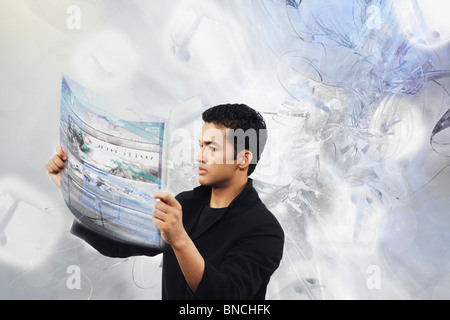 Man examining a futuristic touch screen Stock Photo