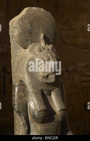 Goddess Sekhmet, goddess of war, represented with head of a lioness and the human body and crowned with the solar disk. Stock Photo