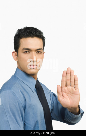 Businessman using biometrics identification Stock Photo