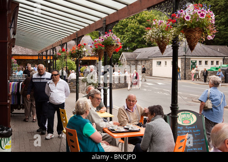 UK, Wales, Snowdonia, Betws y Coed, railway station, visitors on day trip from Llandudno in cafe Stock Photo