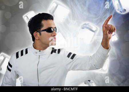 Pilot using touch screen Stock Photo