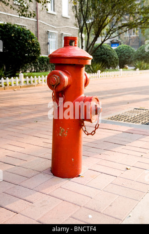 Vintage red fire hydrant in roadside Stock Photo