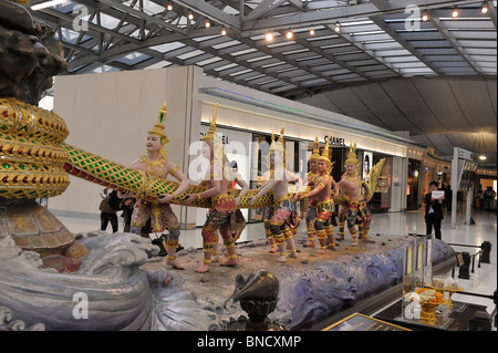 Sculpture depicting the Churning of the Milk Ocean Suvarnabhumi International airport Bangkok Thailand Stock Photo