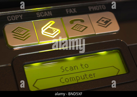 Control panel on a multifunction or All-In-One printer indicating selection of the scan option. Stock Photo