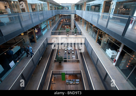 Interior view of atrium of Stilwerk upmarket interior design shopping mall in Berlin Germany Stock Photo