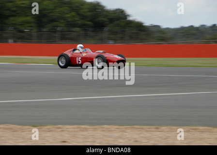 A classic old red Ferrari racing car at Silverstone Stock Photo