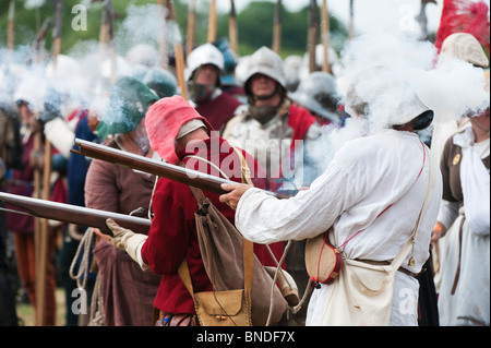 Medieval gunner on the battlefield at the Tewkesbury medieval festival 2010, Gloucestershire, England Stock Photo