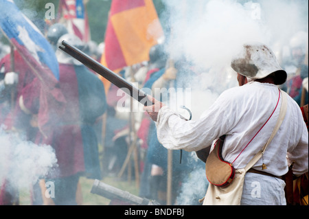 Medieval gunner on the battlefield at the Tewkesbury medieval festival 2010, Gloucestershire, England Stock Photo