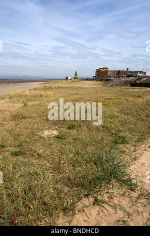 Beach and seafront at Fleetwood showing rubble where the pier use to be before it burnt down in 2008 Stock Photo