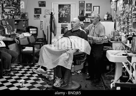 Russell Hiatt Cutting Hair in Floyd's City Barber Shop in Mount Airy, North Carolina Stock Photo