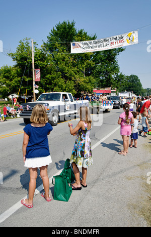 Young Girls Watching the Oldest Continuous Independence Day Parade in America in New Pekin, Indiana Stock Photo