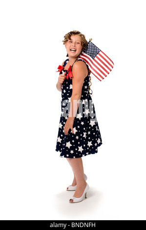 Portrait of young girl in studio laughing with American Flag Stock Photo