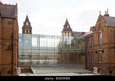 Glass link walkway joining two buildings at Saint Charles Hospital London. Stock Photo