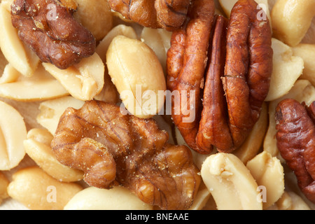 close up of mixed nuts roasted salted peanuts walnuts and pecans Stock Photo