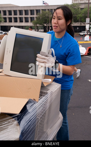 Engineering students from the University of Texas coordinate an 'E-Waste Drive' to recycle old computers and electronics Stock Photo