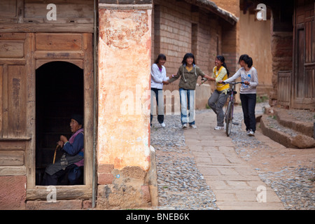 Old and young in Shaxi Village, Yunnan Province, China Stock Photo