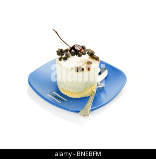 piece of fresh fruit cake on white background Stock Photo