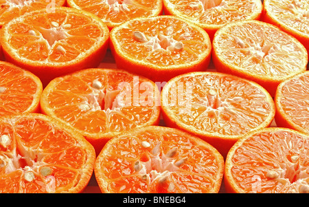 ripe orange mandarine cutted in half  Stock Photo