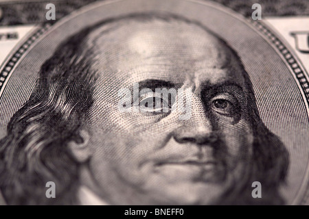 Close Up of the eyes of Benjamin Franklin on the front of a US $100 Bill Stock Photo
