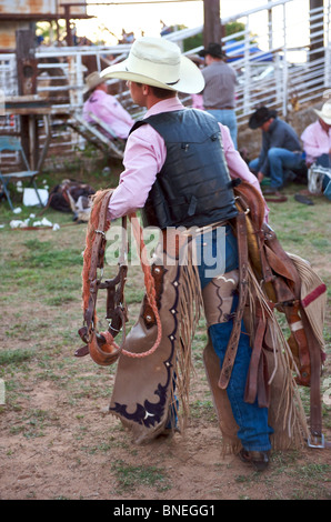 Cowboy gearing up for Texas rodeo USA Stock Photo - Alamy