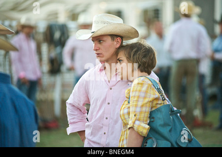 Cowboy with his wife backstage at  PRCA rodeo event in Bridgeport  Texas, USA Stock Photo