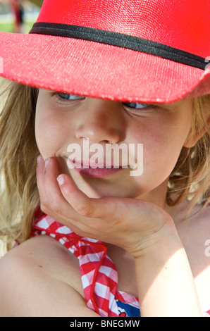 Six Year Old Girl Posing With A Cowboy Hat in, Texas, North America, USA Stock Photo