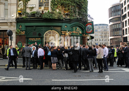 Crowd of people evacuated from a building near Liverpool Street Station London England UK Stock Photo