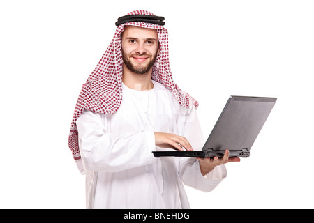 An arab person working on laptop Stock Photo