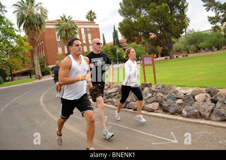 Marines who are students work out during the Marine Platoon Physical Training at the University of Arizona, Tucson, AZ, USA. Stock Photo