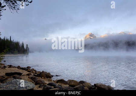 Misty dawn over Redfish Lake, Sawtooth Mountains, Rocky Mountains, Idaho, USA Stock Photo