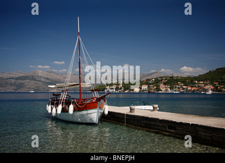 Traditional small fishing boat at jetty on Lopud South Dalmatia Croatia Dalmatian Croatian island elafiti elaphite islands Stock Photo