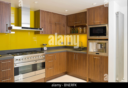 Shot of a Brand New Contemporary Walnut Kitchen Stock Photo