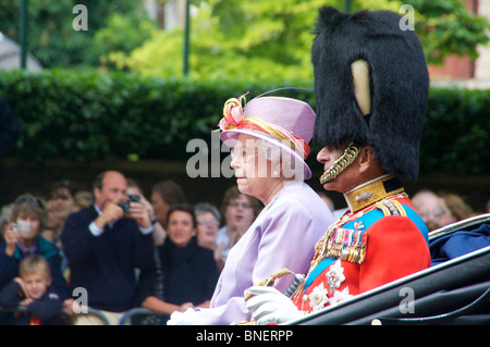 HRH Queen Elizabeth II and HRH The Duke of Edinburgh in their carriage on The Mall during Trooping the Colour 2010 London UK Stock Photo