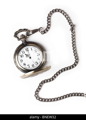 Antique pocket watch on a chain with open lid. Isolated on white background. Stock Photo