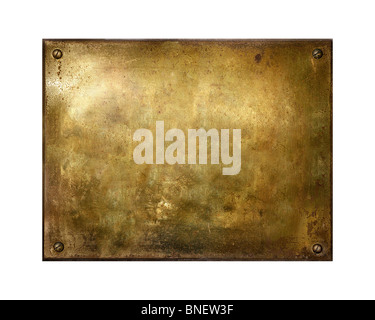 Grungy brushed yellow metal brass plate with screws Stock Photo