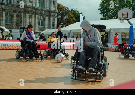 Paris, France, Small Crowd Peope, French Teenagers, Handicapped Sports, Students Playing Basketball in Wheelchairs, Street, diverse people group Sport Stock Photo