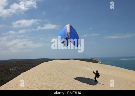 Paraglider Preparing Take Off Over the Dunes du Pyla Near Arachon France Stock Photo