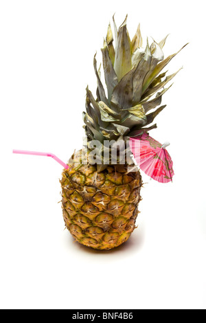 Pina Colada Pineapple Cocktail isolated against white background. Stock Photo