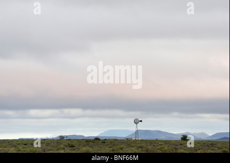 Old windmill in desert, near Camdeboo National Park, Graaf Reinet, Great Karoo, South Africa Stock Photo