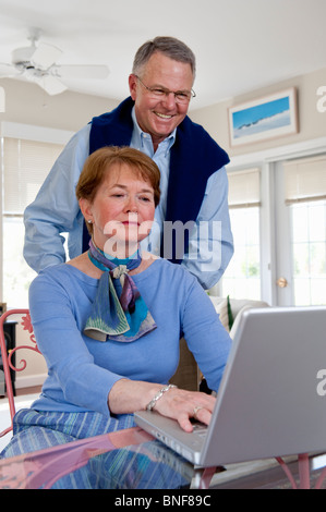 Mature couple working on computer Stock Photo
