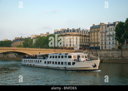 Boat on River Seine summer evening Paris France Europe