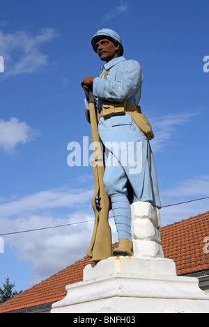 WWI War Memorial at St Genis de Hiersac, France, with sculpture of soldier Stock Photo