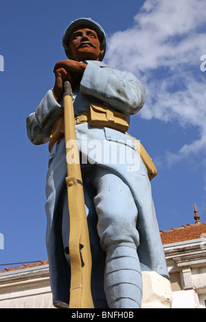 WWI War Memorial at St Genis de Hiersac, France, with sculpture of soldier Stock Photo