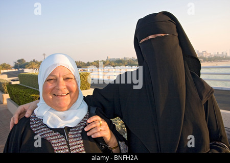 Local women in Dubai dressed in traditional Muslim style. Stock Photo